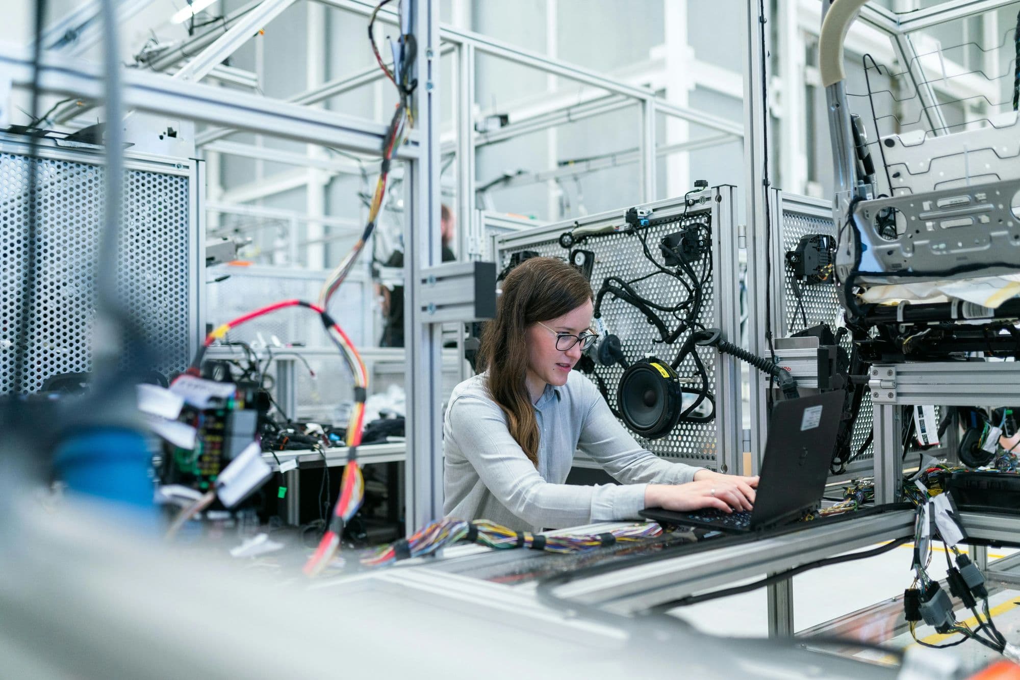 An engineer at an electronics test bench